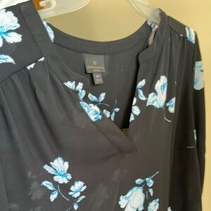 Elegant Black Blouse with Blue Floral Design
